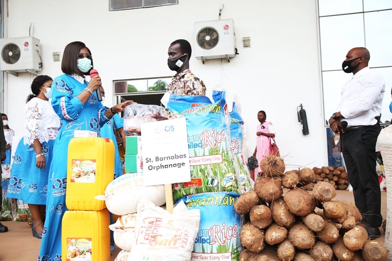 The wife of the Delta State Governor and founder O5 Initiative, Dame Edith Okowa (Left) presenting food items to the representative of St. Barnabas Orphanage, Mr. Onyezie Christian during the 2020 World Orphans Day celebration held in Government House, Asaba (PIX: NORBERT AMEDE)