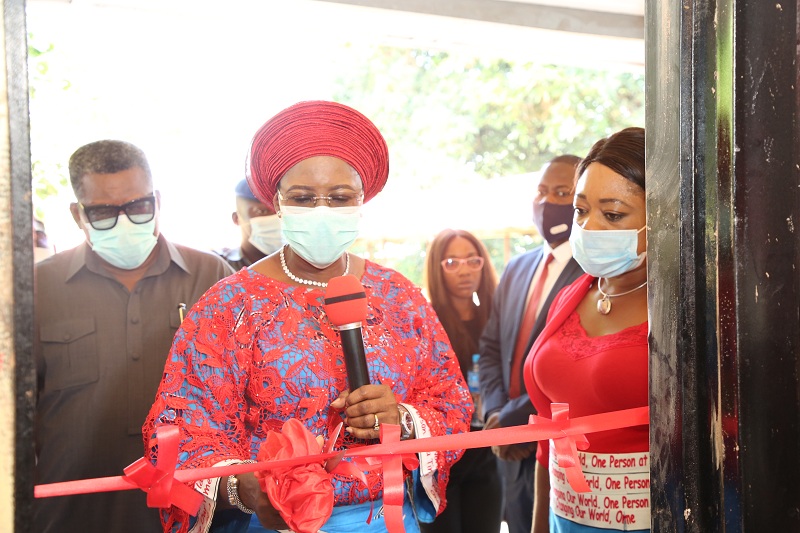 The wife of the Delta State Governor and founder O5 Initiative, Dame Edith Okowa (Middle) cutting the tape to inaugurate Sickle cell Clinic at Akwuku-Igbo General Hospital while the Commissioner of Health, Dr. Mordi Onoye (Left) and the Director-General of O5 and Permanent Secretary ministry of Women Affairs, Mrs. Oghenekevwe Agas watch on Tuesday, November 3, 2020 (Pix: Norbert Amede)