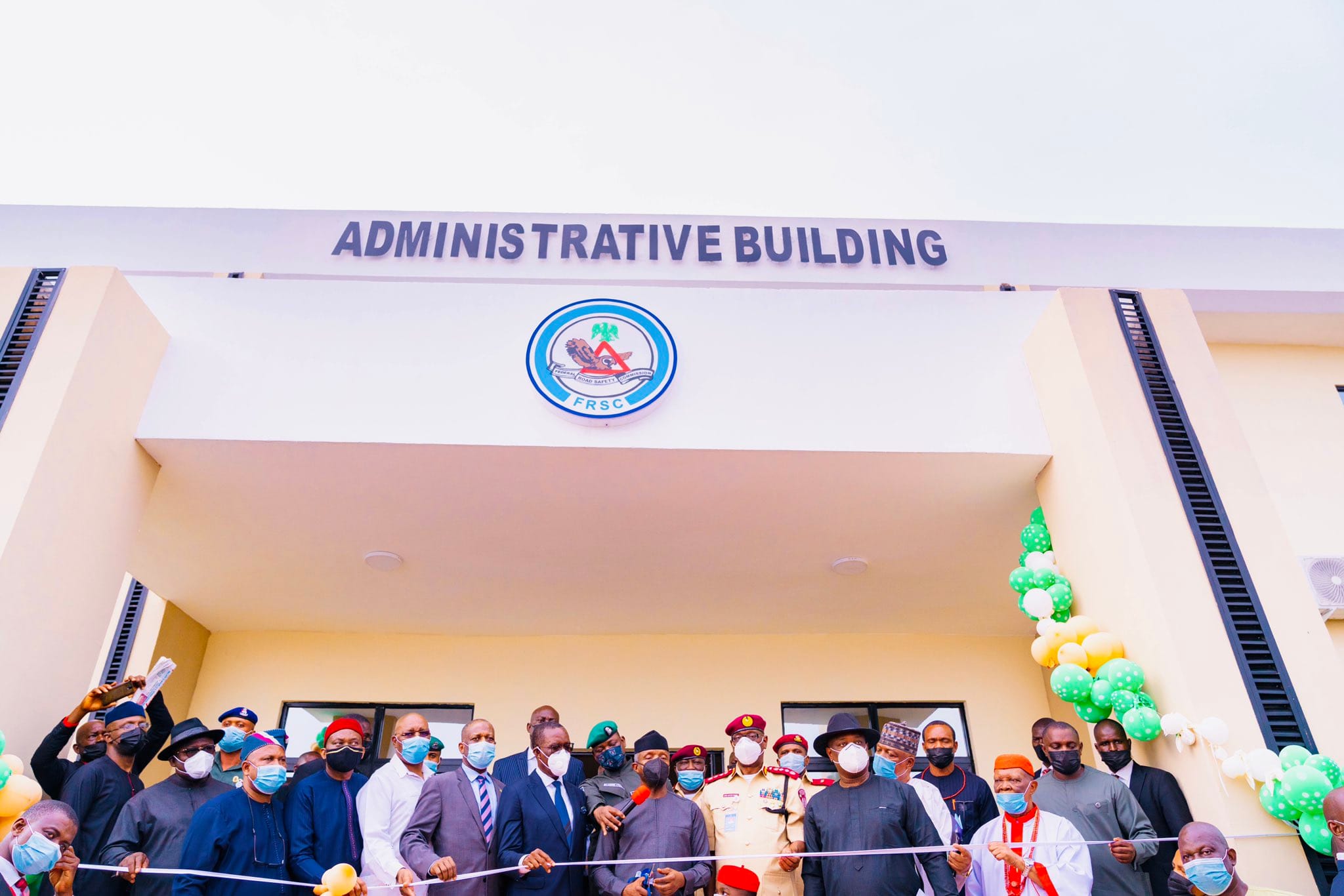 Vice President Yemi Osinbajo (middle) cutting the tape to inaugurate FRSC Marshal Inspectorate Training School, Owa-Alero, Delta State, built by Delta State Government flanked by Delta Governor, Senator Dr Ifeanyi Okowa (left); his Deputy, Mr Kingsley Otuaro; Minority Leader, House of Representatives, Rt .Hon Ndudi Elumelu; Chairman, FRSC Board, Mallam Bukhari Bello; Speaker, Delta State House of Assembly, Rt Hon Sheriff Oborevwori; Minister of State for Labour and Productivity, Festus Keyamo, SAN (right); Corps Marshal, FRSC, Boboye Oyeyemi and HRM, Dr Emmanuel Efeizomor II, Obi of Owa on Thursday, May 6, 2021