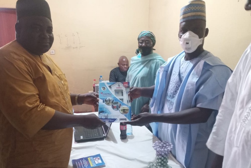 National Coordinator, Center for Peace and Environmental Justice, CEPEJ, Comrade Mulade Sheriff and President, Kano Civil Societies Forum, Ibrahim Wayya Exchanging Souvenirs.