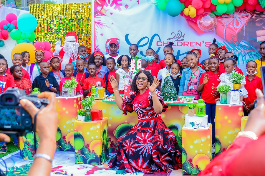 Wife of the Delta Governor and Founder O5 Initiative, Dame Edith Okowa (down right) with Children from across the state during the celebration of the 2021 Children Christmas Party held in Government House, Asaba on December 16, 2021
