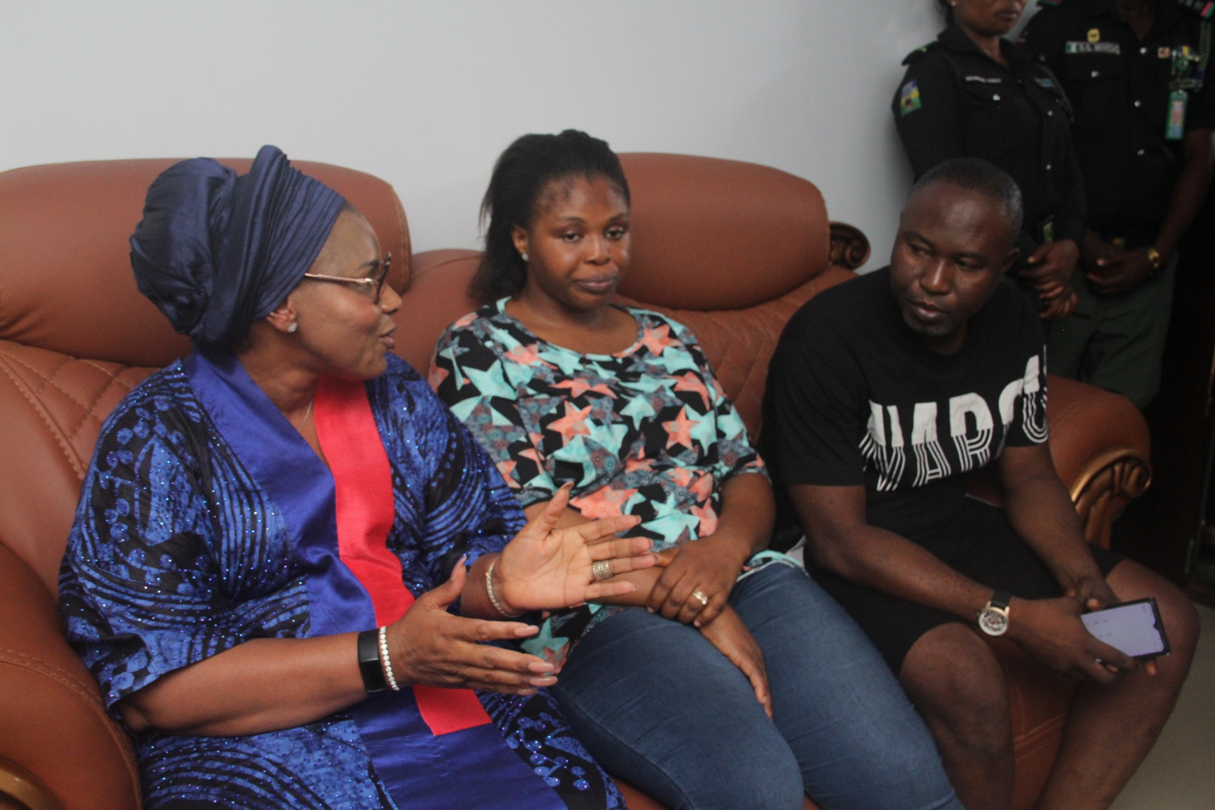 The wife of the Delta State Governor Deaconess Mrs Tobore Oborevwori (Left) praying for the family of Mr. and Mrs. Fidelis Omorhiakogbe on her visit to condole the family over the death of their two year old baby killed from a stray bullet by NDELA operatives in Asaba.