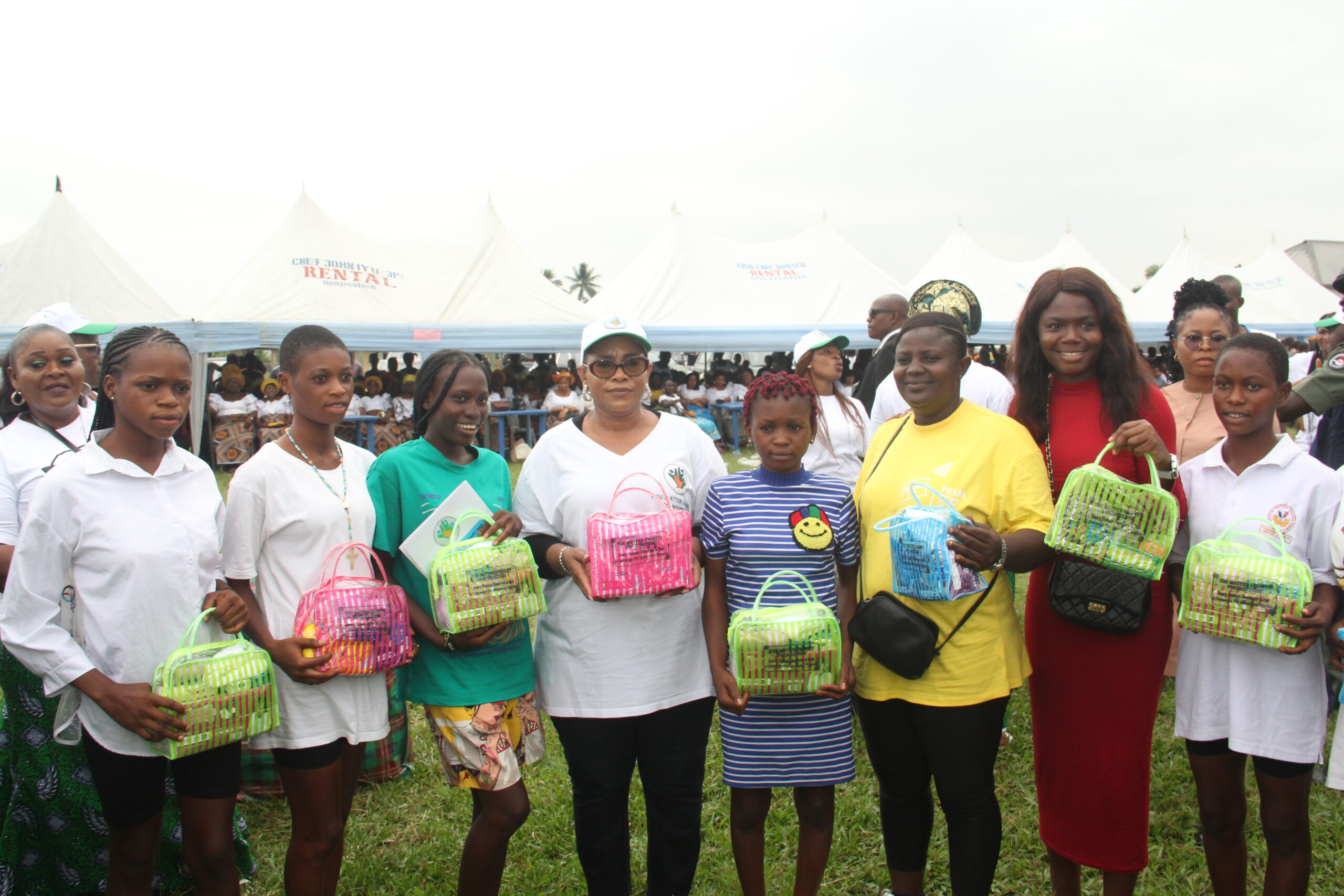 The wife of the Delta State Governor and Founder You Matter Charity Foundation Deaconess Mrs Tobore Oborevwori (Middle) in a photograph with some female youths of Evwreni Community shortly after presenting sanitary pads to them during the Menstrual Hygiene Sensitization in the Community on Thursday, August 10, 2023 (Pix: Norbert Amede)