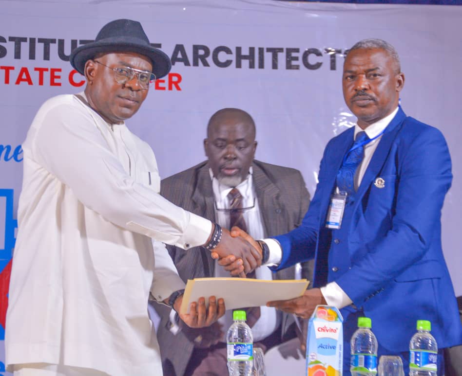 Delta State Commissioner for Lands and Surveys Chief Emamusi Obiodeh (Left) and Delta State Chairman of the Nigerian Institute of Architects (NIA), Architect Pius Amromanoh, at the Archi- Delta Expo 2023 held in Asaba on Thursday, September 14, 2023.