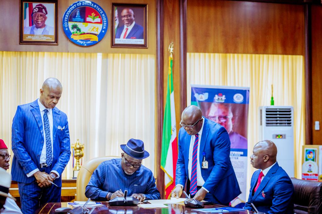 Delta Governor, Rt. Hon. Sheriff Oborevwori (sitting) signs the 2024 Appreciation Bill into law in Government on Wednesday while the Speaker, Delta State House of Assembly, Rt. Hon. Emomotimi Guwor (right), Clark of the House, Otto Aghoghopia (2nd right) and the representative of the Solicitor General, Barr. Ben Adigwe (left) look on Wednesday, December 20, 2023.