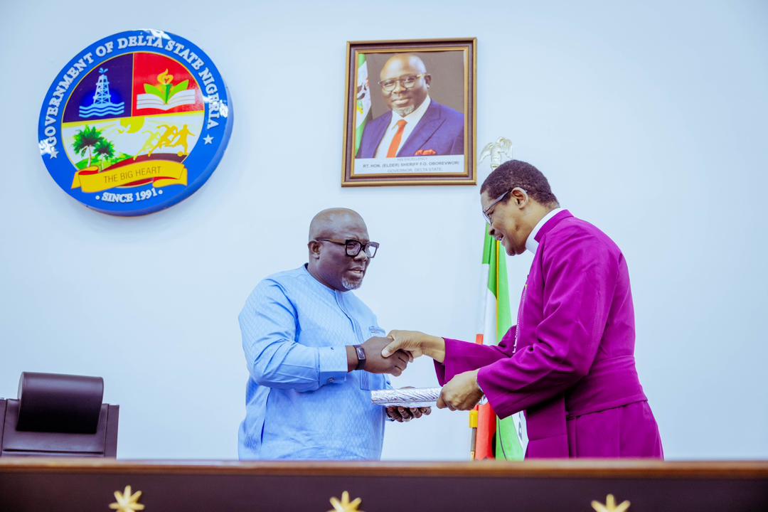 Delta Governor, Rt Hon Sheriff Oborevwori (left), receiving a copy of the Holy Bible from the Primate of all Nigeria, Anglican Communion, Most Rev'd Henry Chukwudum Ndukuba during a courtesy call on the Governor by the Standing Committees of the Church of Nigeria, Anglican Communion in Asaba on Tuesday, February 6, 2024