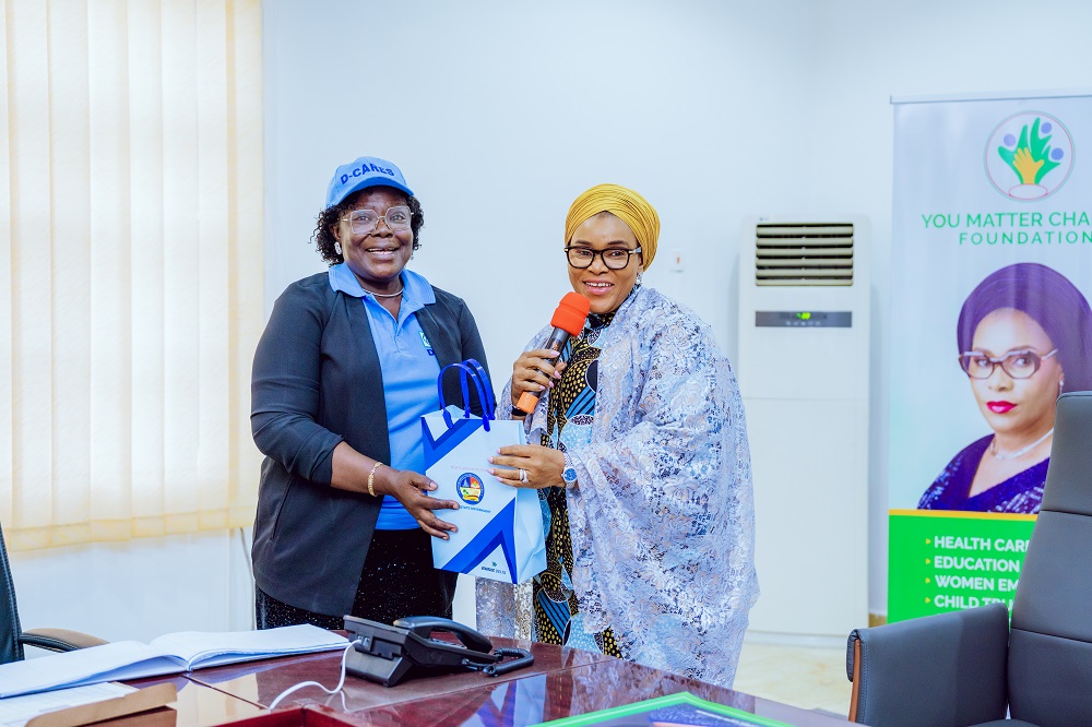 R-L: Founder, You Matter Charity Foundation, Deaconess Tobore Oborevwori making a presentation to the State Coordinator, Delta CARES, Lady Patience Ogbewe during a visit on March 4, 2024