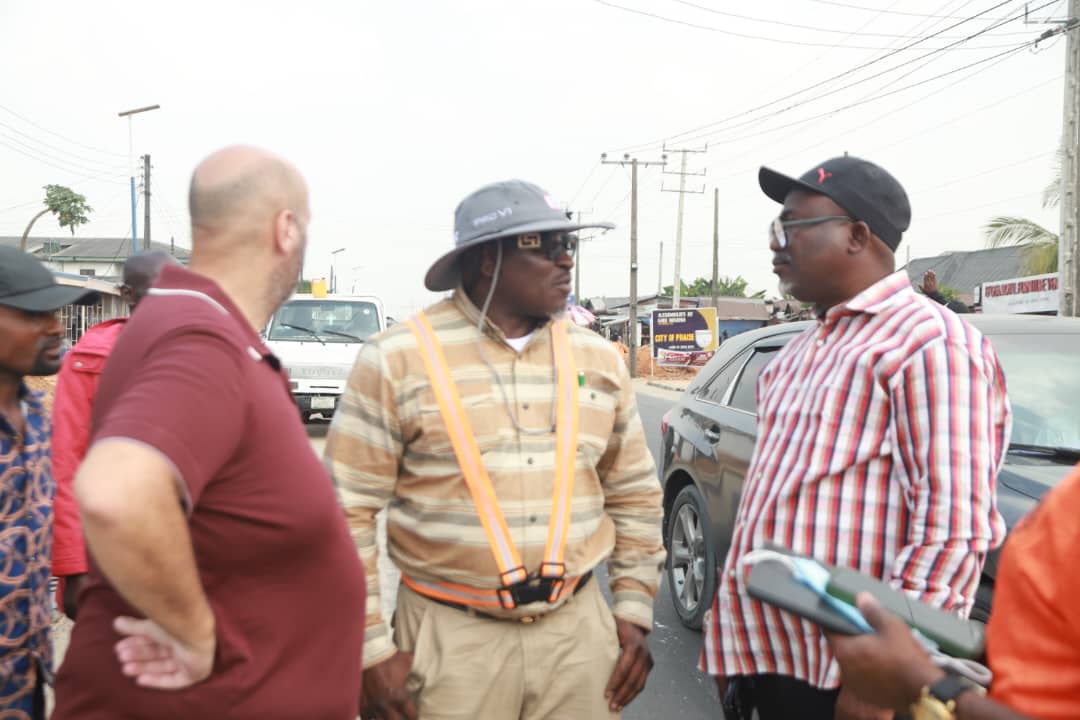 Commissioner for Works, Highways and Urban Roads, Comrade Reuben Izeze (middle) discussing with the Chief Press Secretary to the Governor, Sir. Festus Ahon (right) shortly after Inspecting the maintenance of Uti Road on Wednesday, while the Project Manager Mr. Milad Boutros (left) look on.