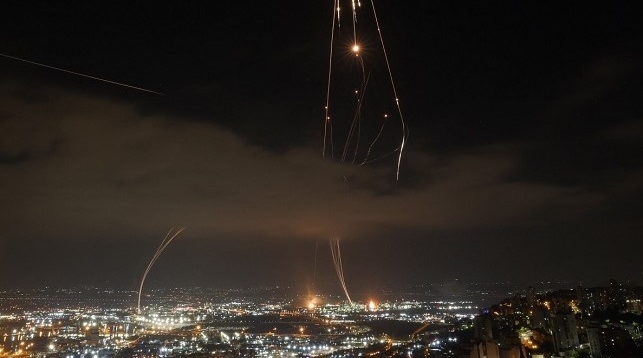 Israeli air defence systems are activated to intercept Iranian missiles over the Israeli city of Haifa amid a fresh barrage of Iranian rockets on June 16, 2025.(Photo by AHMAD GHARABLI / AFP)