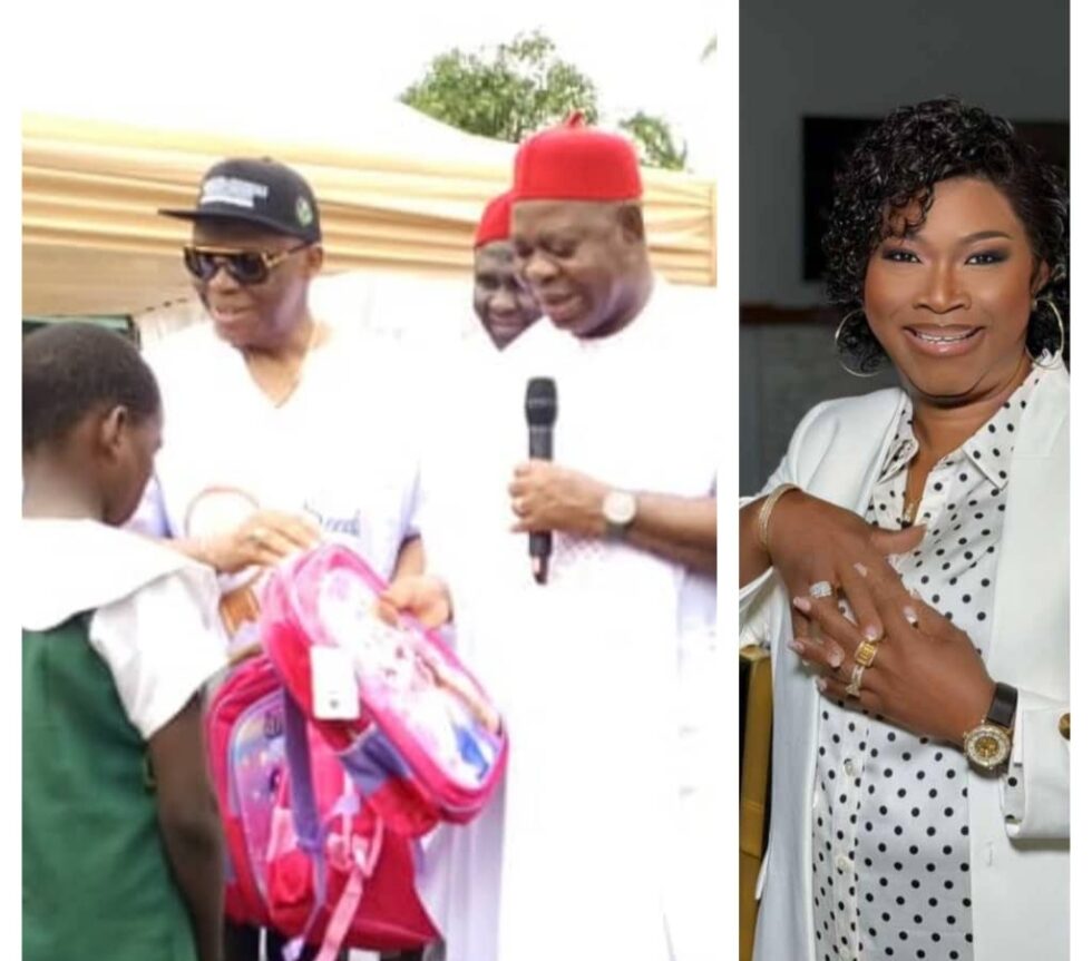 Caption: Founder of Adesuwa-Uadiale Foundation, Dr. (Mrs) Enojare Uvwo Uadiale and Co-founder, Prof. Michael Uadiale and the Delta State Deputy Gov, Sir Monday Onyeme presenting school bag to one of the pupils of Erhavwen Primary School Ekrerhavwen Community, Ughelli North LGA