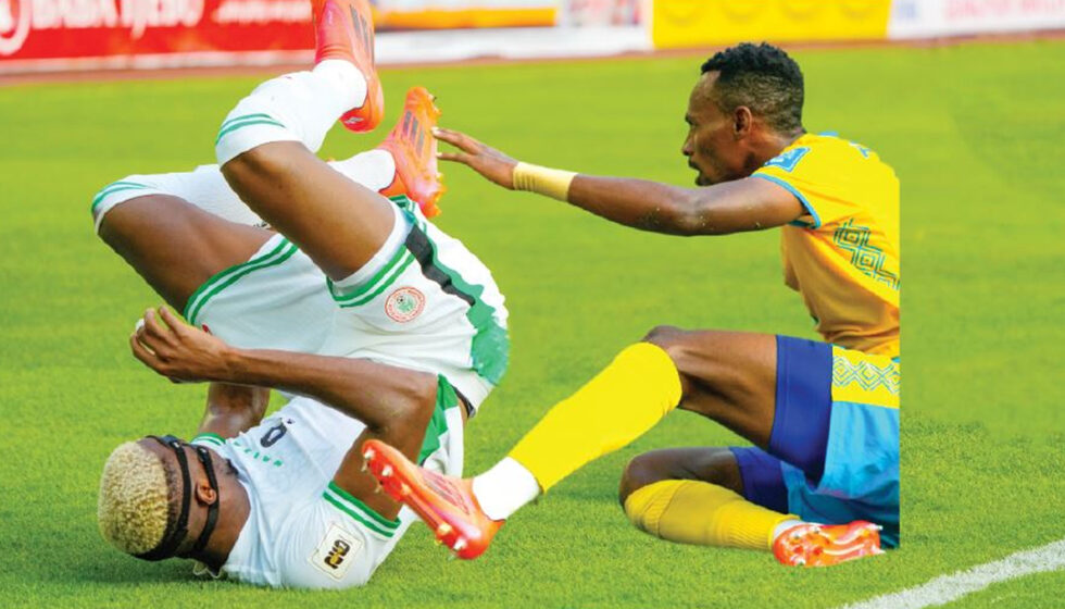 Rwanda’s Claude Niyomugabo challenges Nigeria’s Victor Osimhen during the World Cup qualifier in Uyo on Saturday, September 6, 2025.