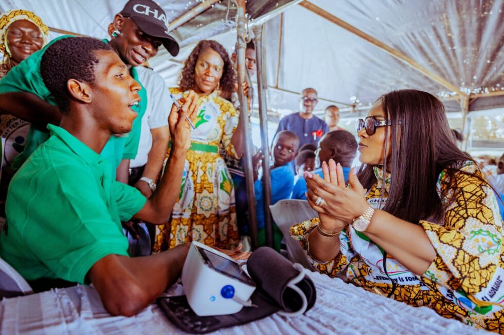 Wife of Delta State Governor and Founder, You Matter Charity Foundation, Deaconess Tobore Oborevwori (right) discussing with a Special Needs child during a Free Medical Outreach by her foundation to beneficiaries in Ughelli, Delta Central senatorial District on Thursday, November 27, 2025.