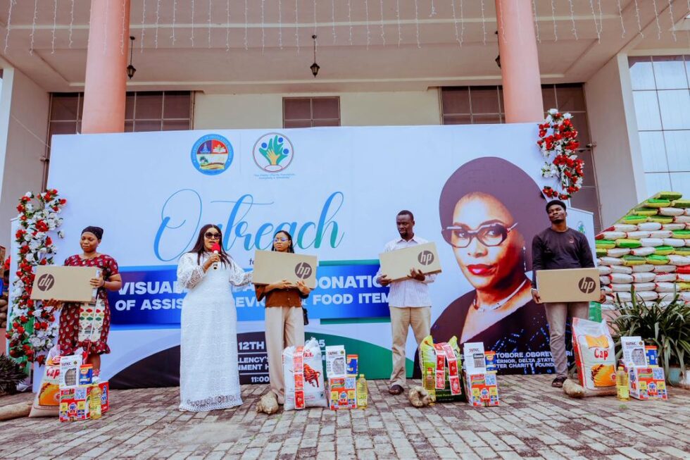 Wife of the Delta State Governor and Founder, You Matter Charity Foundation, Deaconess Tobore Oborevwori presents specialized computers and food items to Visually Impaired students during an outreach by her foundation to the Blind Community in Delta State on November 12, 2025.