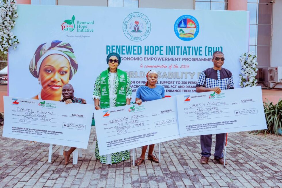 Wife of the Governor of Delta State, Deaconess Tobore Oborevwori (2nd left) in a group photograph with select beneficiaries of the Grant by the Renewed Hope Initiative (RHI) during the celebration of the 202 International Day of Persons with Disabilities in Delta State at Government House Asaba on November, 3, 2025