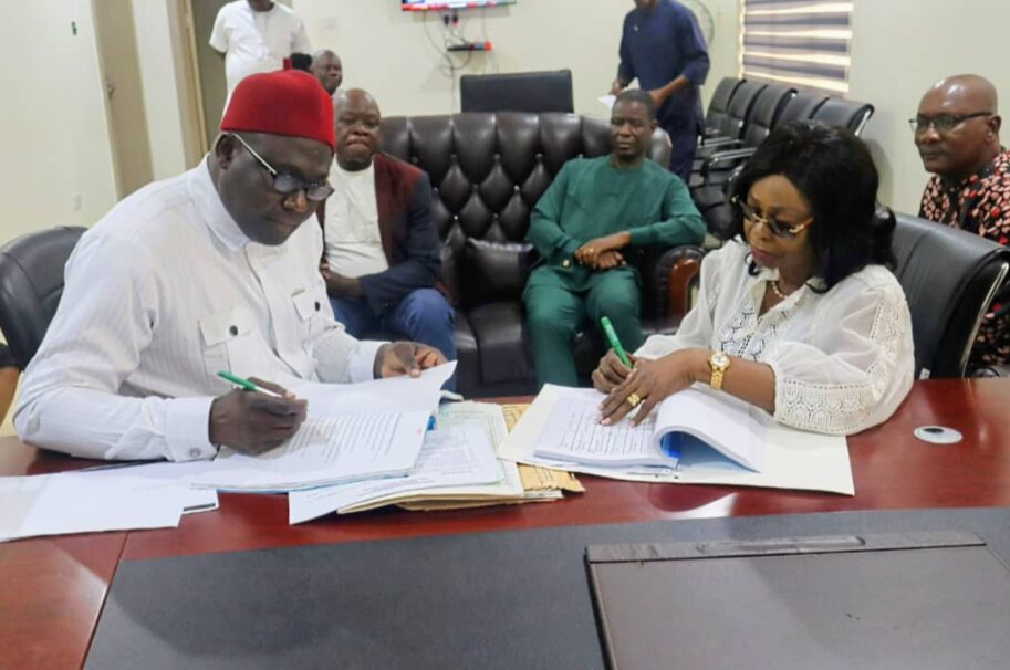 Commissioner for Primary Education, Dr. Kingsley Ashibogwu (left), and Commissioner for Secondary Education, Chief Rose Ezewu (right), formally sign off from their former positions during the handover ceremony held on Thursday, January 15, 2026, at the Prof. Chike Edozien Secretariat, Asaba