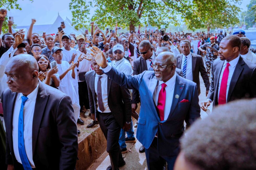 Governor Sheriff Oborevwori of Delta State (right), acknowledging cheers from students of the Dennis Osadebay University, Asaba, during the maiden convocation ceremony of the university in Asaba on Saturday, March 7, 2026