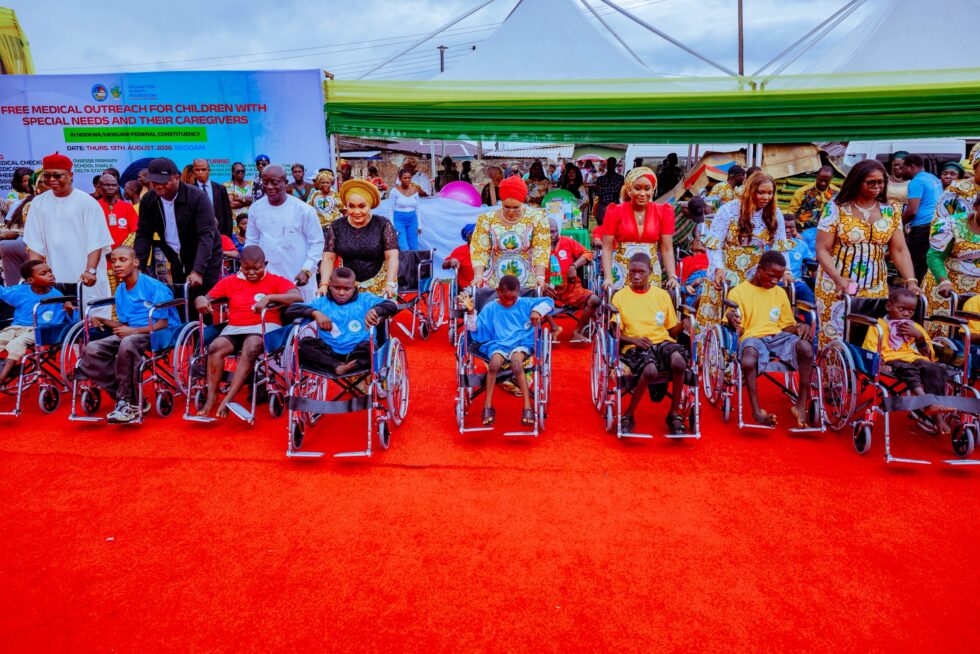 The wife of Delta State Governor and Founder, You Matter Charity Foundation, Deaconess Tobore Oborevwori (center); wheeling a child with special needs supported by the wife of Deputy Governor, Ezinne Catherine Onyeme (4th left), Chairmen and Chairpersons of Ndokwa East, Ndokwa West and Ukwuani LGAs during the Free Medical Outreach for children with special needs in Ndokwa/Ukwuani Federal Constituency held at Kwale.