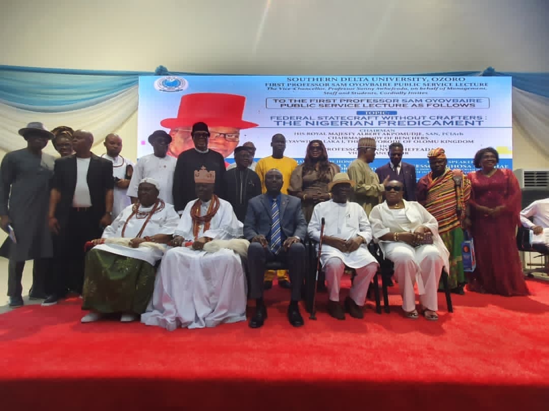 Representative of Governor Sheriff Oborevwori, Prof. Nyerhovwo Tonukari (seated, centre); the Orodje of Okpe Kingdom, HRM Maj. Gen. Felix Mujakperuo (Rtd), CFR (second left); Chairman of the occasion and the Ohworode of Olomu Kingdom, HRM Albert Akpomudje, SAN, Eyavwien-Alaka I (left); and Prof. Sam Oyovbaire with his wife (right), during the inaugural Professor Sam Oyovbaire Public Service Lecture held at the Southern Delta University, Orerokpe Campus, on Thursday, August 6, 2026