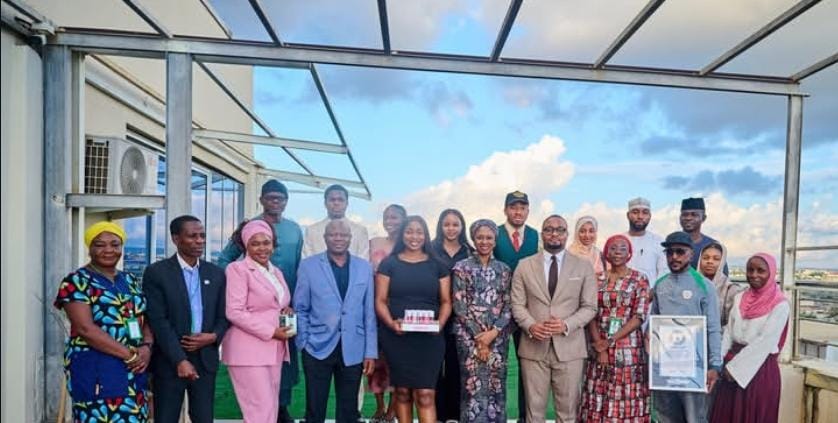 SMEDAN DG Charles Odii and NIPC Executive Secretary Aisha Rimi (5th and 6th from right) flanked by others after a strategic meeting at SMEDAN Headquarters in Abuja.