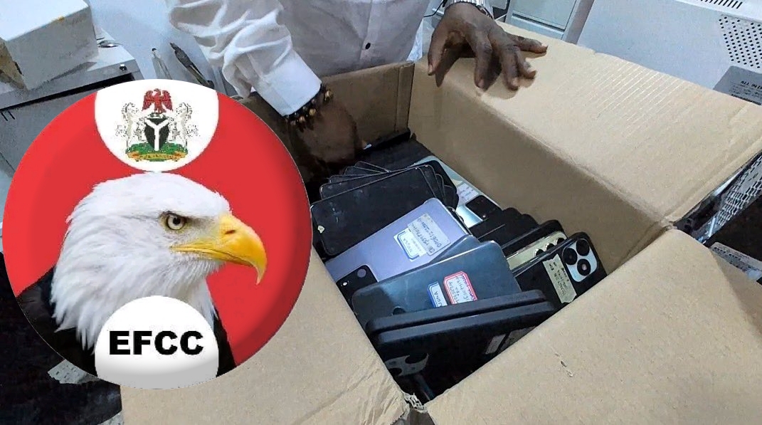 EFCC logo alongside confiscated mobile phones linked to the Chinese cyber fraud syndicate in Victoria Island Lagos.