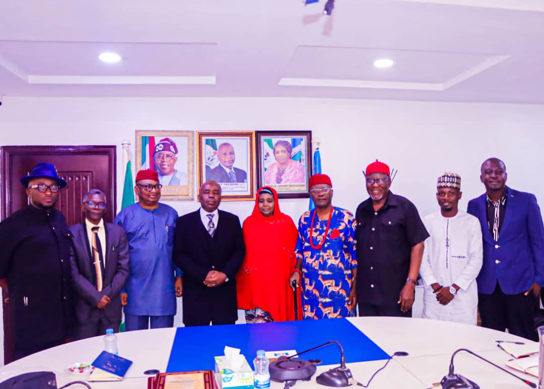 A group photograph of DG of NAPTIP, Binta Lami Adamu Bello, and Director-General of Next2None Support Initiative, Mr. Sam Obu Esq., and Mr. Frank Nwala, officials of NAPTIP and other members of Next2None at the event.
