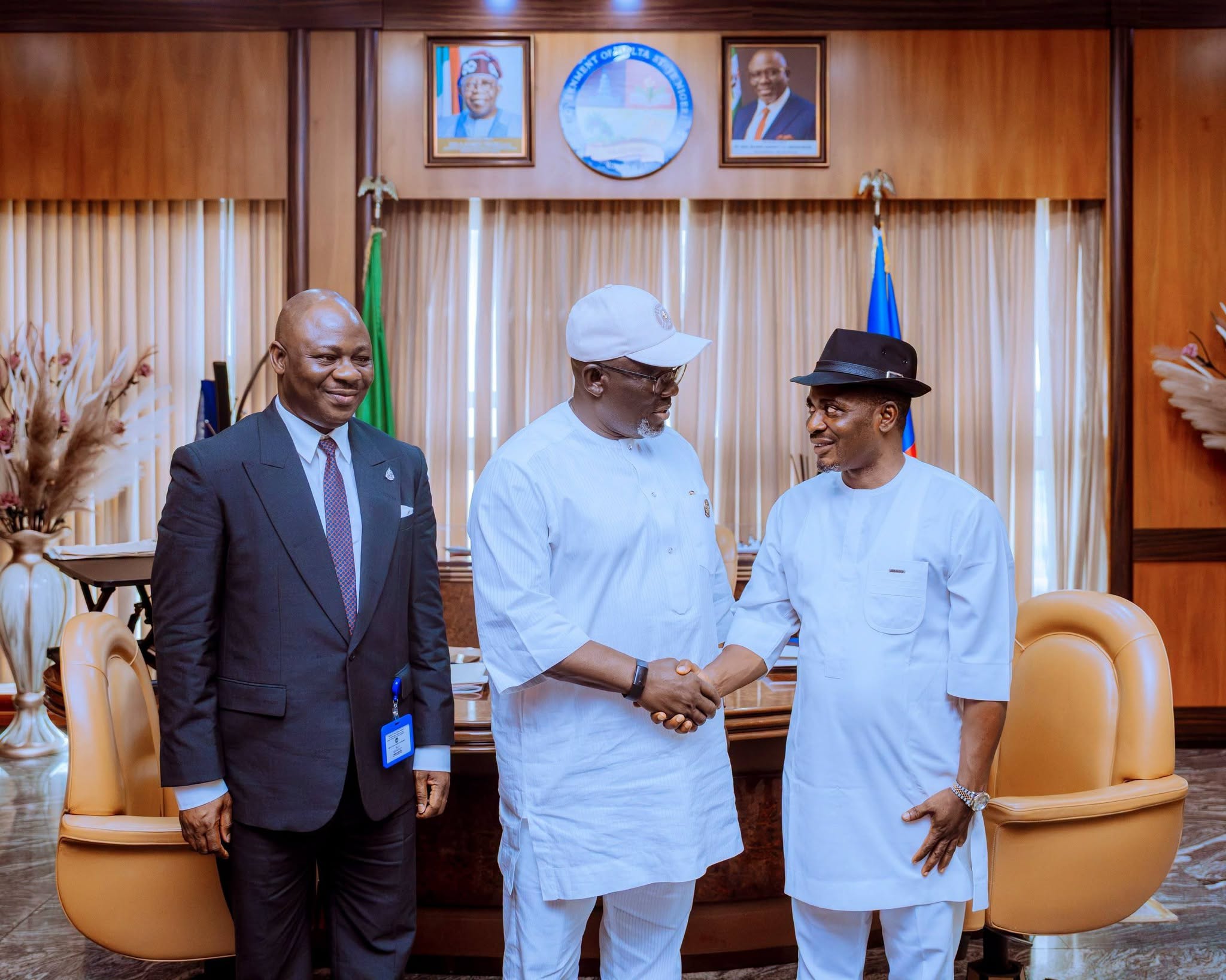 Governor Sheriff Oborevwori congratulating newly sworn-in DTHA member Hon. Ator Okolosi and Speaker Emomotimi Guwor at Government House Asaba.