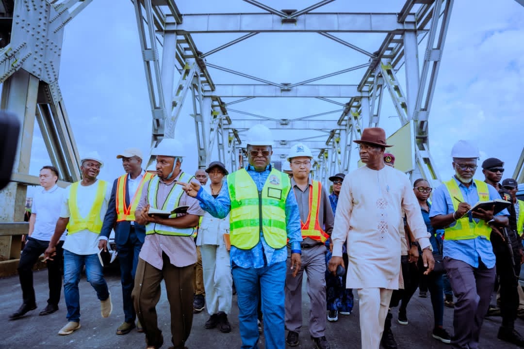 Minister of Works Senator David Umahi (center) inspecting ongoing structural rehabilitation on the First Niger Bridge at Onitsha Bridge Head.
